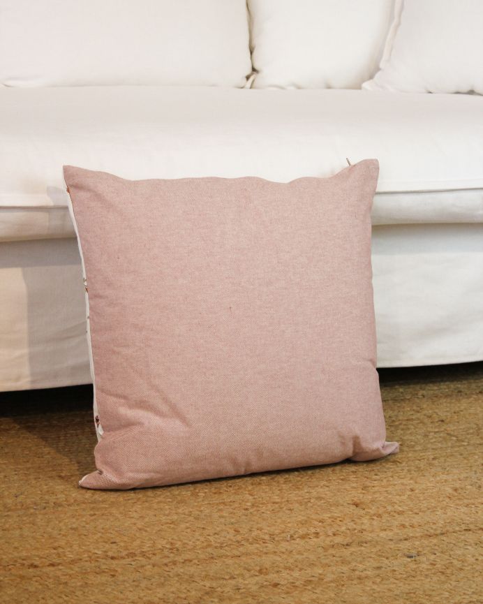 Funda de cojín con estampado floral sobre fondo crudo y reverso rosa 50x50cm de algodón