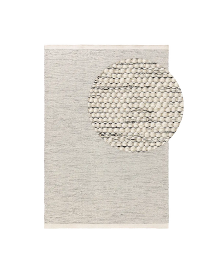 Alfombra de lana beige y negro