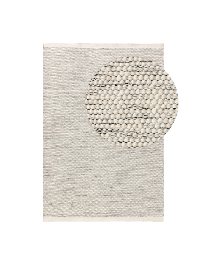 Alfombra de lana beige y negro